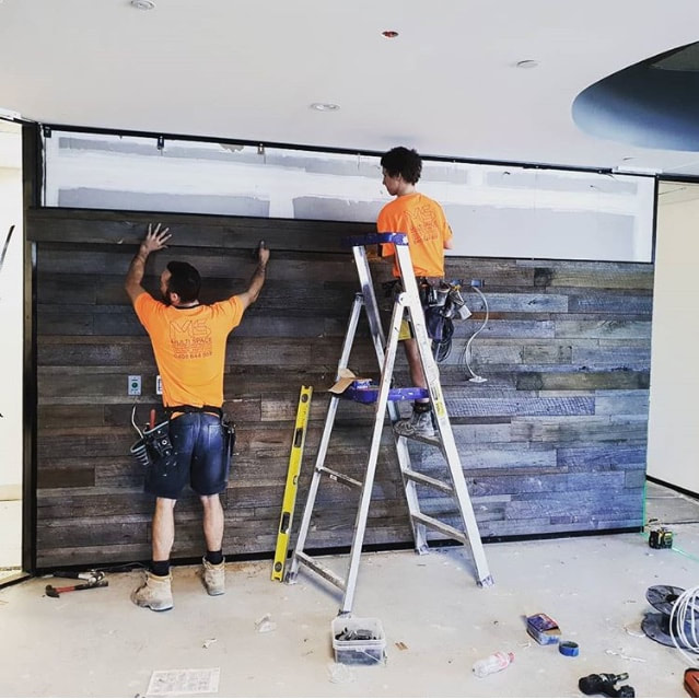 Installing a recycled timber feature wall 3