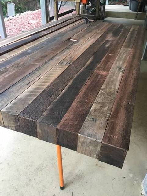 Skip sanded and wire brushed recycled hardwood timber for tables