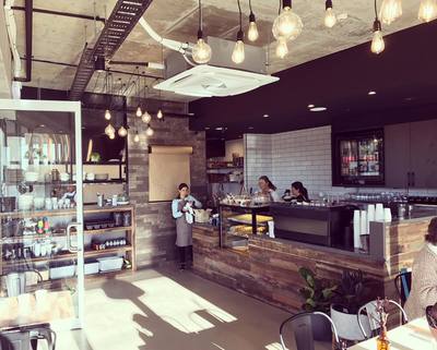 Cafe fit out in Revesby using reclaimed, recycled Sleeper Panels by Northern Rivers Recycled Timber.