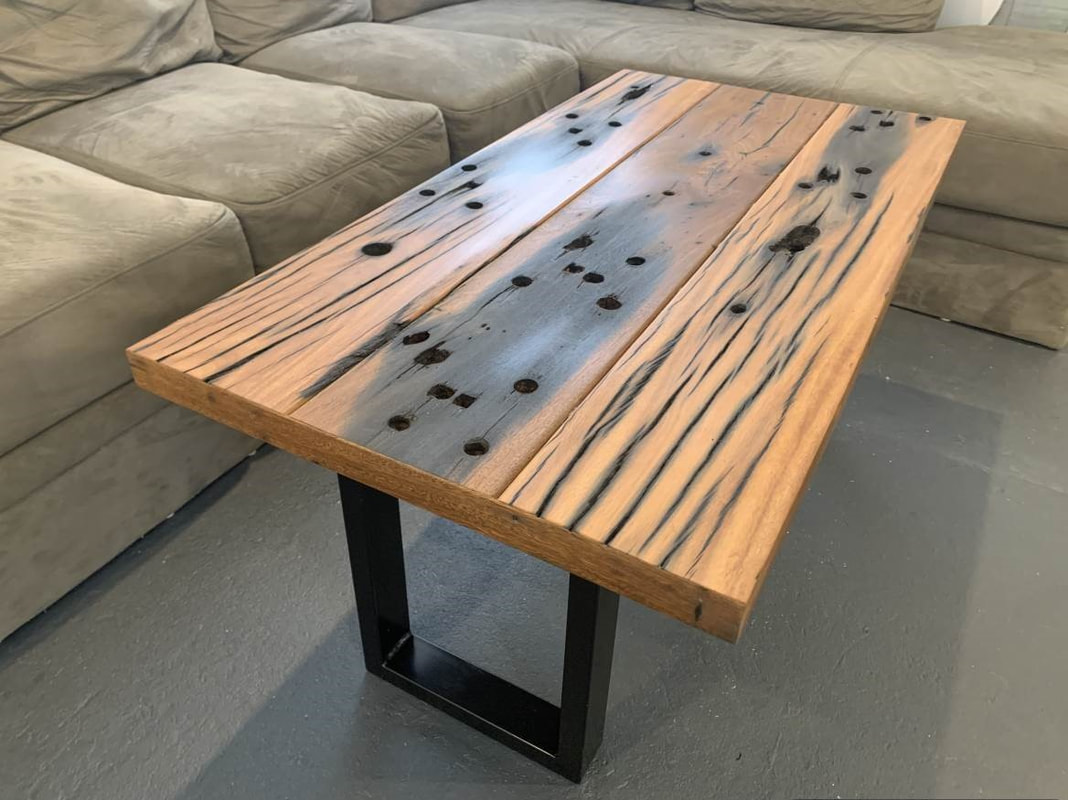 Railway sleeper table with high feature boards
