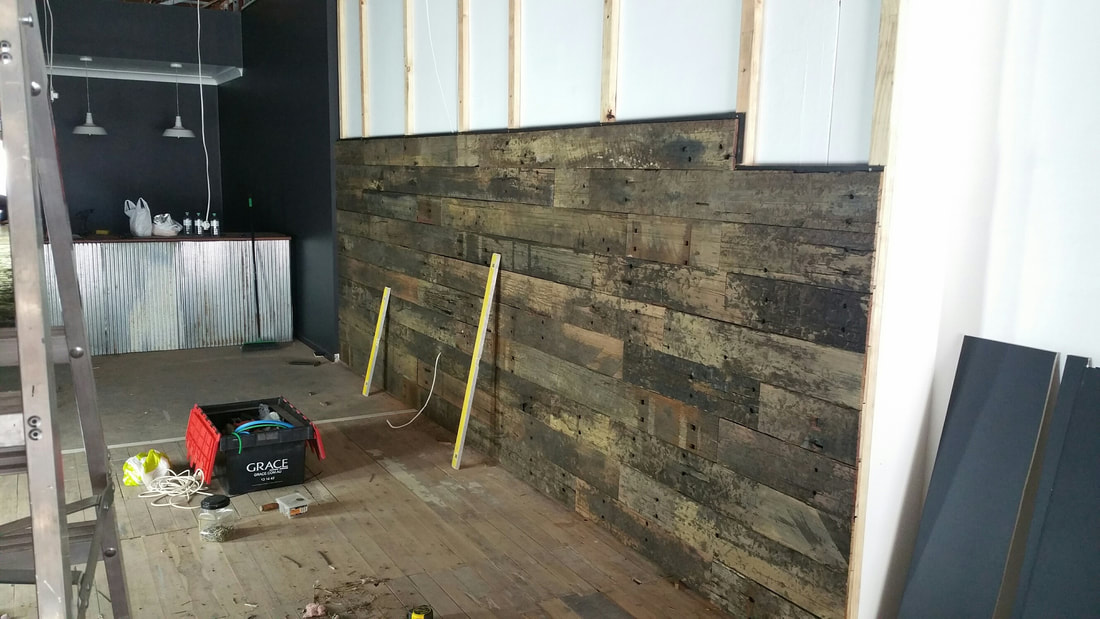 Installing a recycled timber feature wall 5