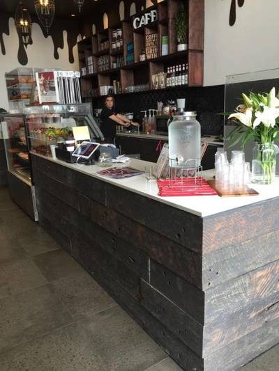 Cafe fit out using reclaimed, recycled sleeper panels in Oran Park Sydney NSW by Northern Rivers Recycled Timber
